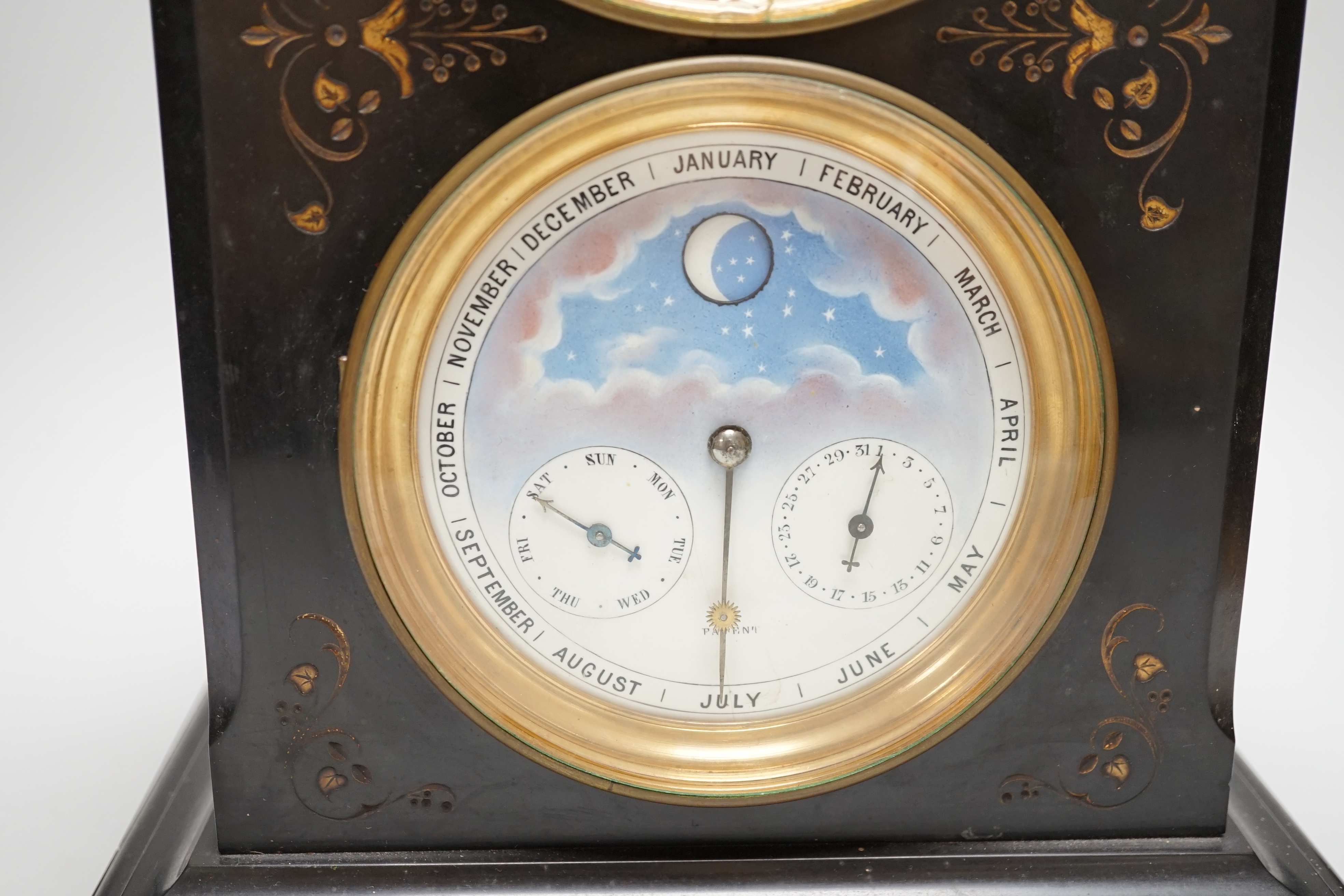 A late 19th century French black slate mantel clock with brocot style escapement and second dial with calendar work, 39.3cm high
